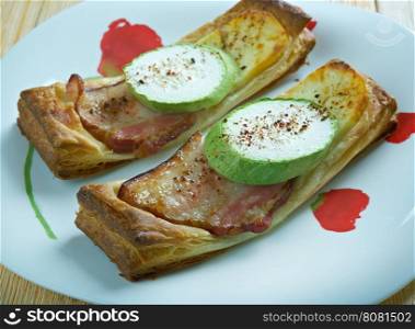 Pastry tart bacon cheese and zucchini