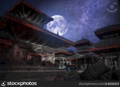Patan .Ancient city in Kathmandu Valley. Nepal.At night the moon and stars shine.. Patan