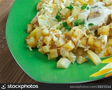 Patatesli yumurta - fried potatoes with eggs and spices.Turkish cuisine