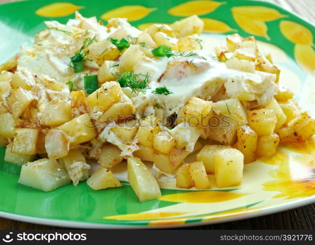 Patatesli yumurta - fried potatoes with eggs and spices.Turkish cuisine