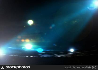 Patches of light. Abstract image of light flashes against dark background
