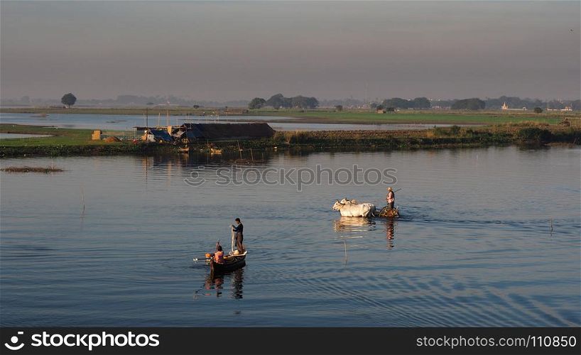 Path of Life of fisherman and farmer at river side in Amarapura Mandalay, Myanmar with wonderful sun light in the morning