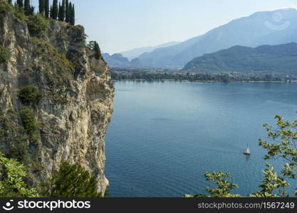 Path of Ponale, on the Garda lake, Trentino, Italy, made from the old road from the Ledro valley. View of Riva del Garda