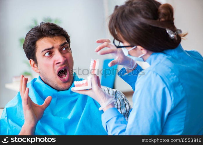 Patient afraid of dentist during doctor visit