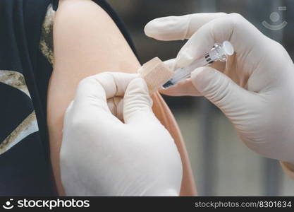 Patient asian woman health check by get vaccinated against the flu covid19 or corona virus every year by the Ministry of Health at hospital in concept illness, outbreak, healthcare in life. Patient asian woman get vaccinated the flu covid19