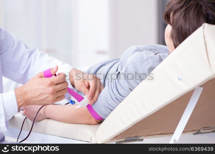 Patient getting blood transfusion in hospital clinic