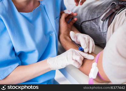 Patient getting blood transfusion in hospital clinic