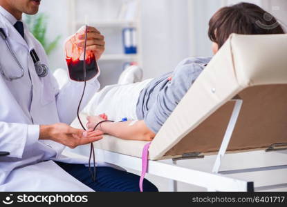 Patient getting blood transfusion in hospital clinic