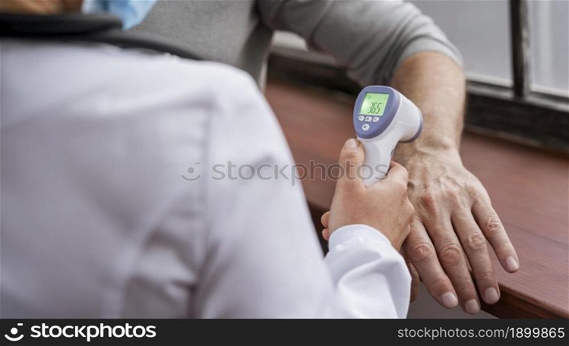 patient having his temperature checked 2. Resolution and high quality beautiful photo. patient having his temperature checked 2. High quality beautiful photo concept