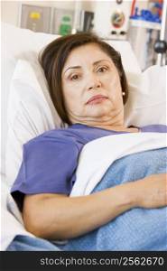 Patient Lying In Hospital Bed