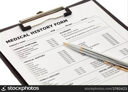 Patient medical history form with pen isolated on white background