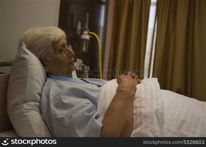 Patient resting in hospital bed