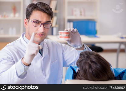 Patient visiting dentist for regular check-up and filling