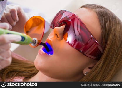 Patient visiting dentist for regular check-up and filling