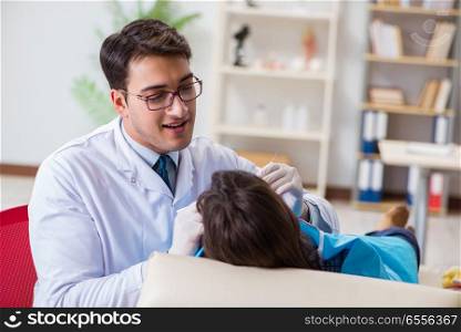 Patient visiting dentist for regular check-up and filling