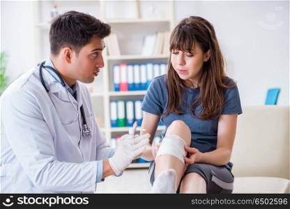 Patient visiting doctor after sustaining sports injury
