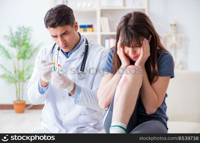 Patient visiting doctor after sustaining sports injury