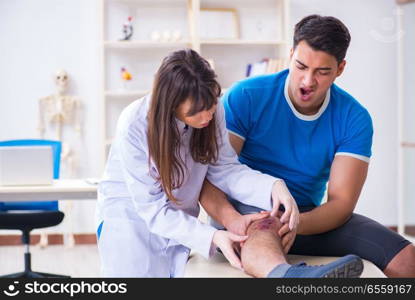 Patient visiting doctor after sustaining sports injury