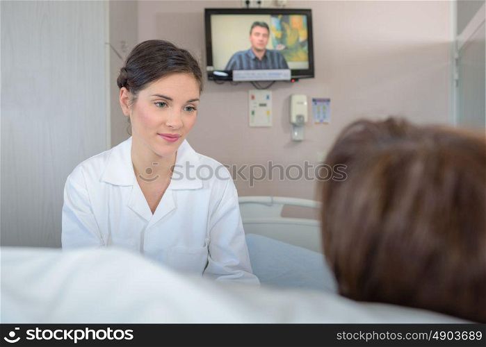 patient watching tv in hospital