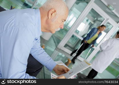 patients in doctors waiting room