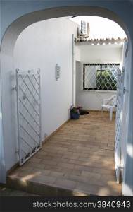 patio in typical white architecture in portugal