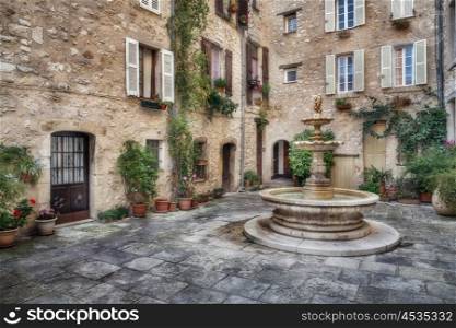Patio with fountain in the old village Tourrettes-sur-Loup , France.
