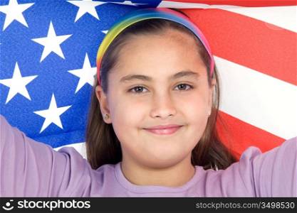 Patriotic little girl with american flag isolated over white