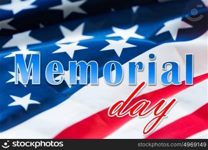 patriotism and national holidays concept - memorial day words over american flag. memorial day words over american flag