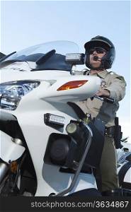 Patrol officer sits on motorcycle