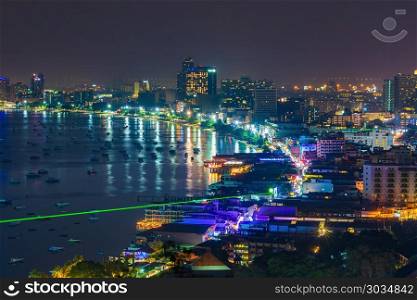 Pattaya city and the many boats docking at night, Thailand. Pattaya city and the many boats docking at night