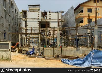 PATTAYA,THAILAND - APRIL 25,2019: Soi Pattayaklang 14 This is a big construction site,where Thai workers were working on a new business building.