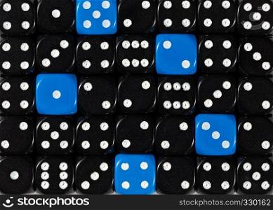 Pattern background of random ordered black dices with five blue cubes. Background of random ordered black dices with five blue cubes