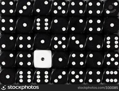 Pattern background of random ordered black dices with one white cube. Background of random ordered black dices with one white cube