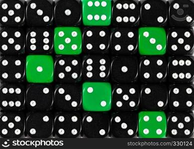 Pattern background of random ordered black dices with six green cubes. Background of random ordered black dices with six green cubes