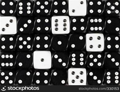 Pattern background of random ordered black dices with sixwhite cubes. Background of random ordered black dices with six white cubes