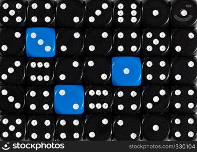 Pattern background of random ordered black dices with three blue cubes. Background of random ordered black dices with three blue cubes