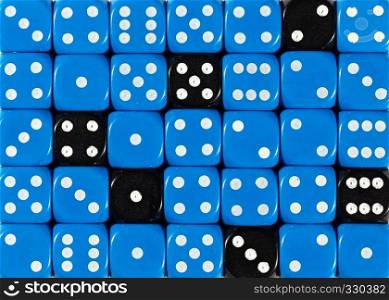 Pattern background of random ordered blue dices with six black cubes. Background of random ordered blue dices with six black cubes