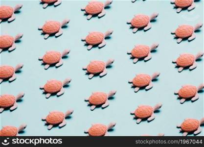 Pattern of beach turtles over a pastel blue background, minimalism, design and digital resource, background with copy space