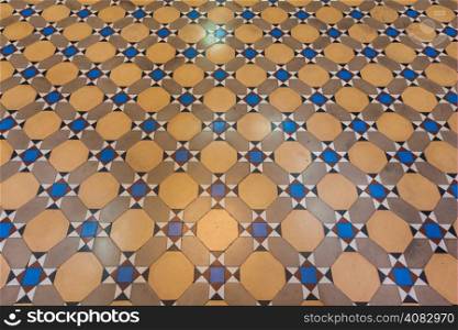 Pattern of colored cotta tile as floor in vintage house,Thailand