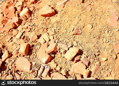 pattern of heap of used demolished red bricks