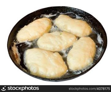 patties frying in pan isolated on white background