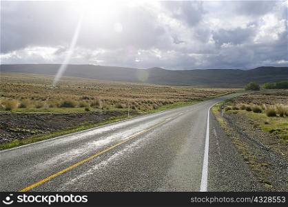 Paved road in rural landscape
