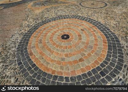 Pavement with concentric pattern. Patterned floor walkway in the park, Montjuic, Barcelona, Catalonia, Spain