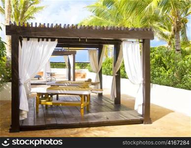 Pavilion for Spa procedures in tropical garden