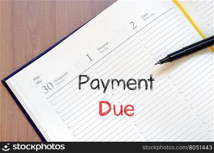 Payment due text concept write on notebook