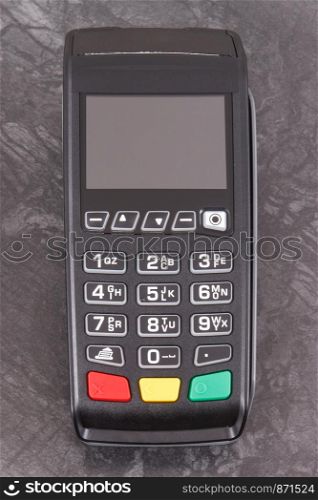 Payment terminal, credit card reader for cashless paying. Finance and banking concept. Payment terminal, credit card reader for cashless paying