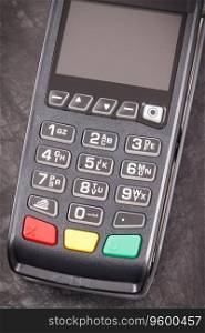 Payment terminal, credit card reader for cashless paying. Finance and banking concept. Payment terminal, credit card reader using for cashless paying. Finance concept