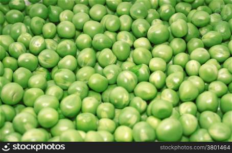 Pea green peas closeup as a background