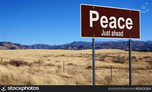 Peace road sign with blue sky and wilderness