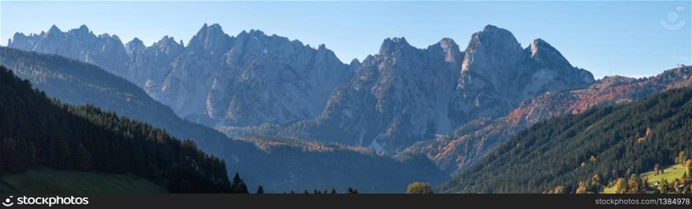 Peaceful autumn Alps mountain panoramic view from Gosau village outskirts, Austria